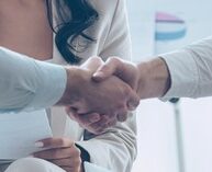 Does Firefly Work with Brand New Agents? 36 Two people shaking hands.